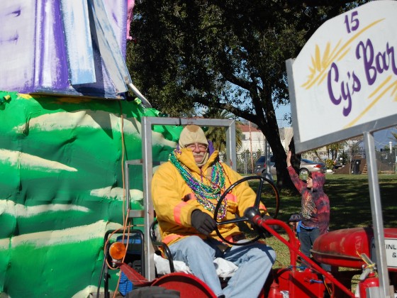 tractor driver bundled up tight