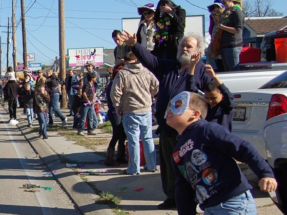 Mask-wearing kid ducks and weaves to make a catch