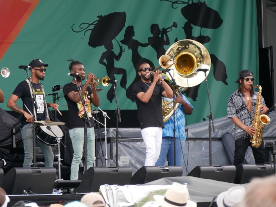 New Breed Brass Band with Trombone Shorty at Jazz Fest 2024 [Photo by Louis Crispino]